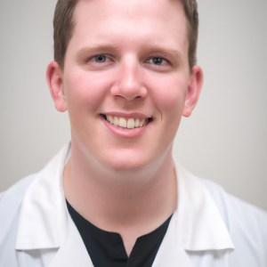 a professional and visually appealing image of a young happy smiling caucasian doctor with white teeth 236 300x300