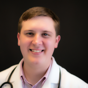 a professional and visually appealing image of a young happy smiling caucasian doctor with white teeth