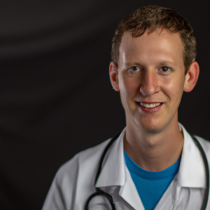 a professional and visually appealing image of a young happy smiling caucasian doctor with white teeth 817 300x300