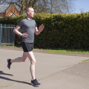 a professional appealing image of a caucasian man or woman jogging on a sunny day