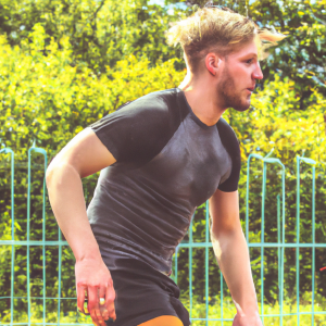 a professional appealing good looking and atheletic image of a caucasian man exercising or playing sports outside on a sunny day 956 300x300