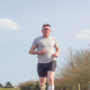 a professional appealing image of a caucasian man or woman jogging on a sunny day